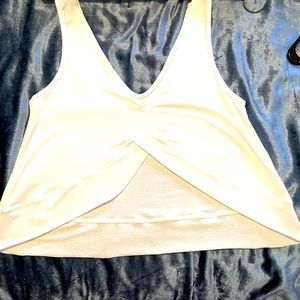 Tank top by Onzie with split back😍 Size M/L Brand New, never worn😀